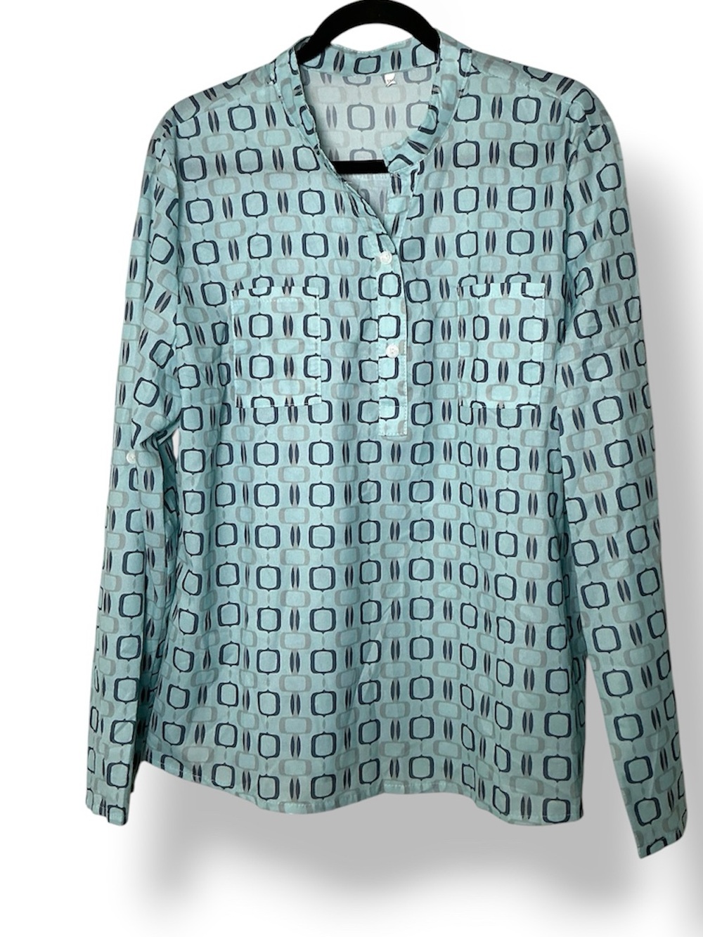 Geometric pattern tunic says 5XL measures like 3XL